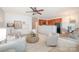 Open-concept living room flows into the kitchen and dining area, great for entertaining at 15554 Stronvar House Ln, Charlotte, NC 28277