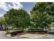 Street view of lushly landscaped community with well-maintained lawns and sidewalks at 15623 Sir Charles Pl, Charlotte, NC 28277