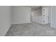 A versatile loft with neutral walls and plush carpet offers a flexible living space at 16042 River Tree Ln, Charlotte, NC 28278