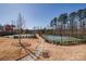 Community tennis courts offer recreational opportunities and neighborhood charm at 16042 River Tree Ln, Charlotte, NC 28278
