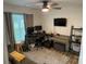 Functional office features multiple monitors, a comfortable seating area, and ample workspace at 1623 Flagler Ln, Charlotte, NC 28216