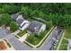 Aerial shot showcasing the exterior of the home, set in a well-manicured yard with mature landscaping at 16615 Crimson Sargent Dr, Charlotte, NC 28213