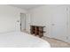Neutral colored bedroom featuring built in shelves, and a light colored carpet at 16615 Crimson Sargent Dr, Charlotte, NC 28213