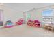 Spacious playroom with ample natural light, perfect for to play with their favorite toys at 16615 Crimson Sargent Dr, Charlotte, NC 28213