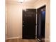 Entryway with new flooring and freshly painted door at 1708 Dogwood Ln, Lancaster, SC 29720