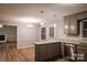 Kitchen area with stainless steel appliances and granite countertops at 1708 Dogwood Ln, Lancaster, SC 29720
