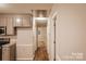 Modern kitchen design with updated cabinets, countertops, and luxury vinyl plank flooring at 1708 Dogwood Ln, Lancaster, SC 29720