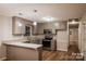 Modern kitchen featuring granite countertops and stainless steel appliances at 1708 Dogwood Ln, Lancaster, SC 29720