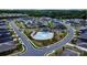 Aerial view showcasing a neighborhood pool and surrounding homes in a well-landscaped community at 1825 Lotus Ln, Denver, NC 28037