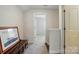 Hallway leading to a bedroom and features neutral paint at 1825 Lotus Ln, Denver, NC 28037