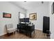 Well-appointed home office with desk, chair, and plenty of natural light for a productive workspace at 1825 Lotus Ln, Denver, NC 28037