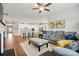 Bright and airy living room featuring an open floor plan with hardwood floors at 1825 Lotus Ln, Denver, NC 28037