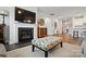 Cozy living room featuring a fireplace, hardwood floors and neutral decor at 1825 Lotus Ln, Denver, NC 28037