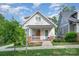 Charming home with welcoming front porch and manicured lawn at 1830 Wickford Pl, Charlotte, NC 28203