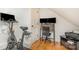 Efficient home office space with desk, Peloton, and natural light at 1830 Wickford Pl, Charlotte, NC 28203
