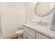 Clean powder room featuring a marble counter and modern fixtures at 1830 Wickford Pl, Charlotte, NC 28203