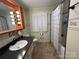 Bathroom with vanity, shower/tub, and unique decorative touches at 2009 Hickory Grove Rd, Gastonia, NC 28056