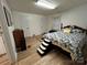 Cozy bedroom with hardwood floors, a comfortable bed, and ample natural light, creating a relaxing retreat at 2009 Hickory Grove Rd, Gastonia, NC 28056