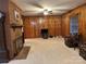 Living room with wood paneling and decorative fireplace at 2009 Hickory Grove Rd, Gastonia, NC 28056