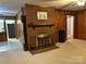 Cozy living room features a fireplace and natural light at 2009 Hickory Grove Rd, Gastonia, NC 28056