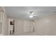 Bedroom with three large closets and ceiling fan providing comfort at 201 Scalybark Trl, Concord, NC 28027