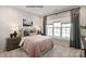 Cozy bedroom featuring two bedside tables, large windows, and plush bedding at 2046 Sabra St # Cwo0006, Gastonia, NC 28054
