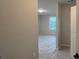 Unfurnished bedroom features a large window, neutral paint, and protective plastic covering the flooring at 2046 Sabra St # Cwo0006, Gastonia, NC 28054