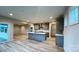 Open concept kitchen with an island, stainless steel appliances, and hardwood floors at 2046 Sabra St # Cwo0006, Gastonia, NC 28054