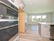 Close-up of kitchen appliances, showing built in microwave and oven at 2046 Sabra St # Cwo0006, Gastonia, NC 28054