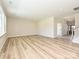 Spacious living room featuring three large windows that provide natural light and views at 2046 Sabra St # Cwo0006, Gastonia, NC 28054