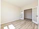 Bright room features wood-look floors and glass paneled doors for a modern design at 2046 Sabra St # Cwo0006, Gastonia, NC 28054