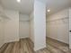 Two walk-in closets offer ample space with wire shelving for optimal organization at 2046 Sabra St # Cwo0006, Gastonia, NC 28054