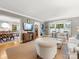 Open-concept living room with hardwood floors and lots of natural light at 2432 Hassell Pl, Charlotte, NC 28209