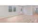 Inviting living room featuring hardwood flooring, neutral paint and double windows at 2511 Linwood Rd, Gastonia, NC 28052