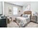 Serene bedroom with soft natural light, a comfortable bed, and calming decor, creating a peaceful retreat at 2517 Mabel Ln, Monroe, NC 28110