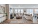 Spacious living room with fireplace, ample seating, and natural light at 2517 Mabel Ln, Monroe, NC 28110