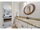 Bathroom vanity with granite countertop and view into bedroom at 309 Palm Cove Way, York, SC 29745