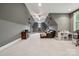 Cozy bonus room offers home theater with ceiling fan, recessed lights, gray walls, seating area and home office nook at 309 Palm Cove Way, York, SC 29745