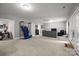 Large finished basement offers versatile space for recreation and entertaining at 327 Wilby Dr, Charlotte, NC 28270