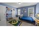 Bedroom with baseball rug and baseball-themed decorations at 327 Wilby Dr, Charlotte, NC 28270