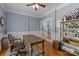 Bright home office with french doors, wood floors, and stylish decor elements at 327 Wilby Dr, Charlotte, NC 28270