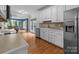 Spacious kitchen showcasing stainless appliances, ample counter space, and a breakfast nook at 327 Wilby Dr, Charlotte, NC 28270