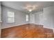 Light-filled bedroom featuring hardwood floors, ceiling fan and neutral paint color at 328 Rose Garden Ct, Rock Hill, SC 29732