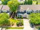 Charming townhome featuring a well-manicured front yard, inviting entrance, and private driveway at 328 Rose Garden Ct, Rock Hill, SC 29732