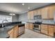 Kitchen featuring stainless steel appliances, granite countertops, and tile flooring at 328 Rose Garden Ct, Rock Hill, SC 29732
