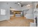 Open-concept living room with hardwood floors seamlessly connected to the kitchen at 328 Rose Garden Ct, Rock Hill, SC 29732