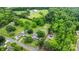 Lush, wooded property featuring a mix of buildings, open green space, and community amenities in a serene setting at 3700 Nevin Rd, Charlotte, NC 28269