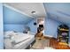 An upstairs bedroom showcases wood floors and is adjoined by an open doorway at 3700 Nevin Rd, Charlotte, NC 28269