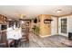 Open concept dining room with dining table, and door, complemented by nice flooring at 3700 Nevin Rd, Charlotte, NC 28269