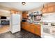 Functional kitchen with essential appliances and ample counter space, ready for your cooking adventures at 3700 Nevin Rd, Charlotte, NC 28269